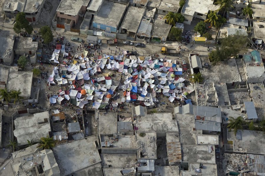 Haitians set up impromtu tent cities through the capital after an earthquake measuring 7 plus on the Richter scale rocked Port au Prince Haiti just before 5 pm yesterday, January 12, 2010.